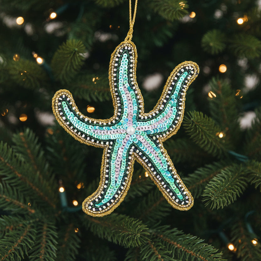 Beaded starfish Christmas decoration hanging on a Christmas tree
