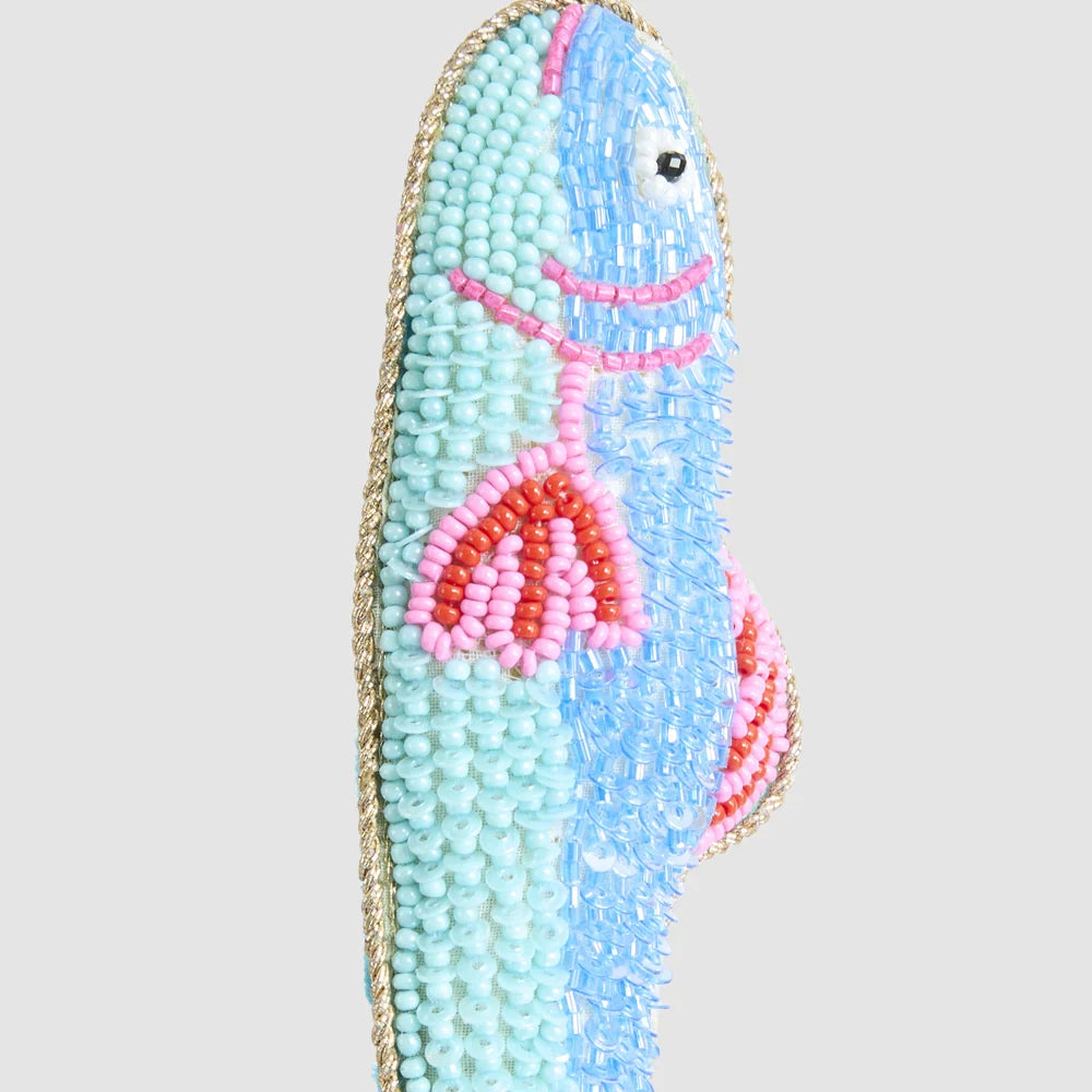 Close-up of the blue and pink beaded fish Christmas ornament