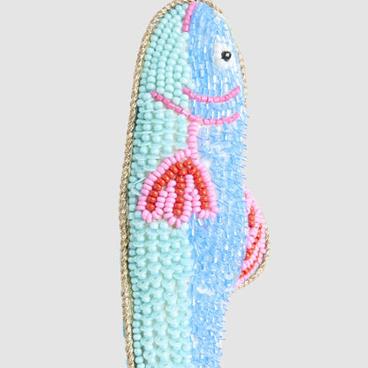 Close-up of the blue and pink beaded fish Christmas ornament