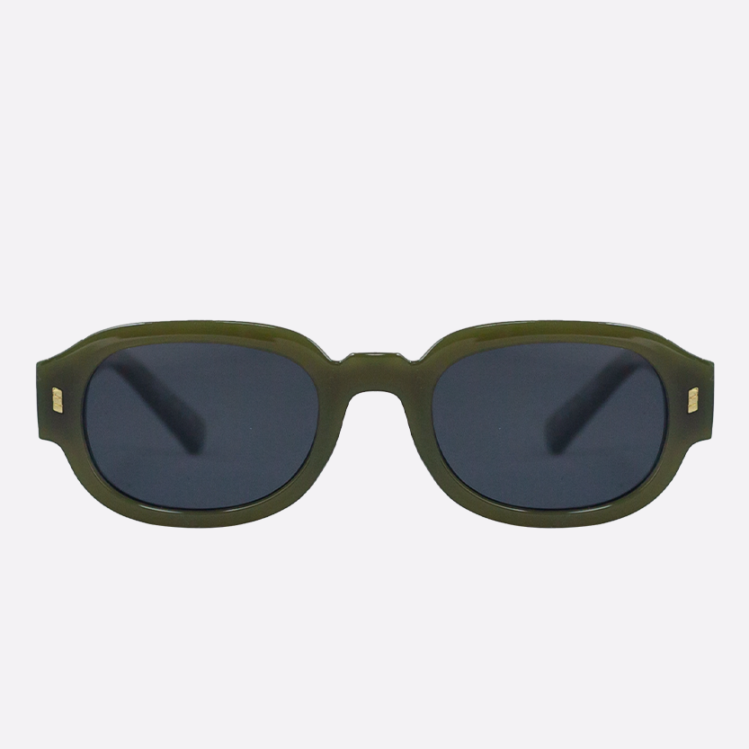 Green sunglasses with dark lenses on a white background