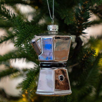 Glass coffee percolator Christmas ornament hanging on a Christmas tree