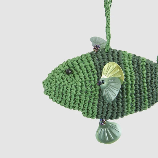 Close-up of the green crochet fish Christmas ornament