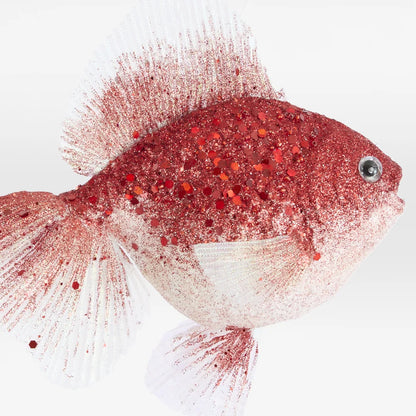 Close-up of the little red fish Christmas ornament